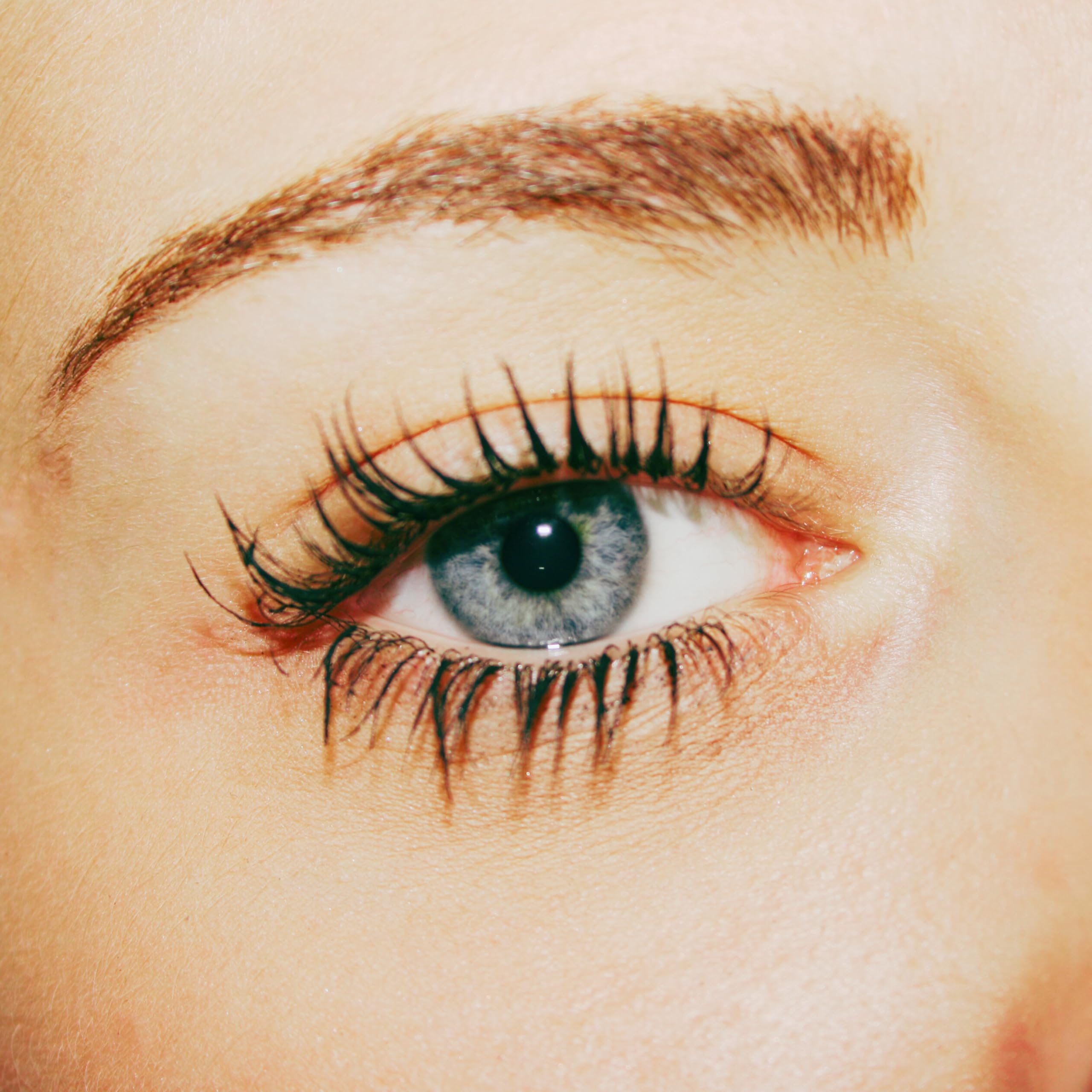 Pacifica Aquarian Gaze texture swipe showing smooth formula that builds length