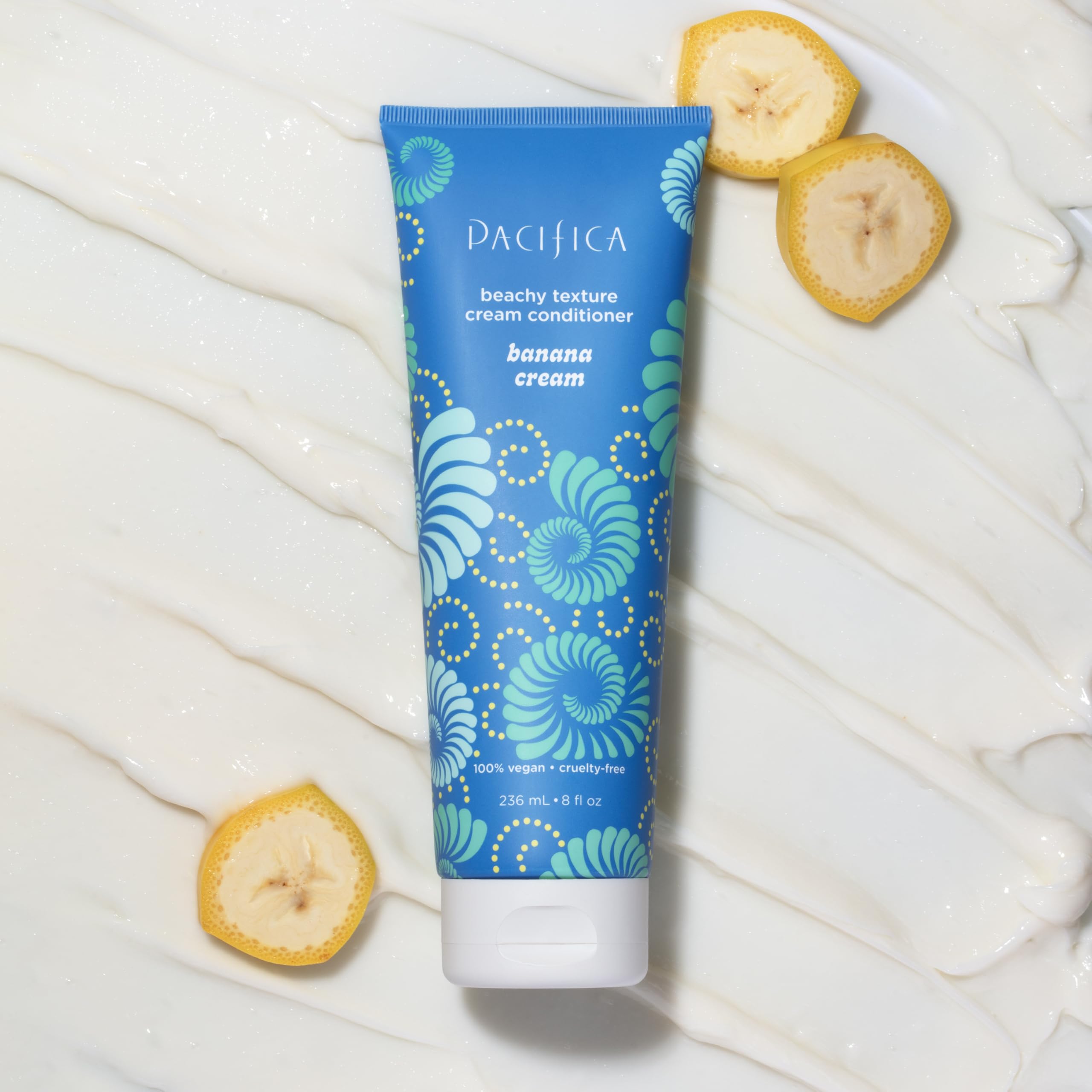 Pacifica conditioner being applied to wet hair showing simple in-shower use