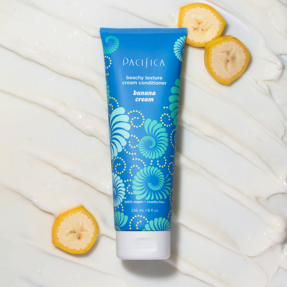 Pacifica conditioner being applied to wet hair showing simple in-shower use