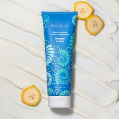 Pacifica conditioner being applied to wet hair showing simple in-shower use