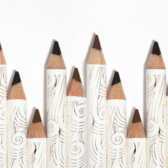 Pacifica pencil being sharpened with cap nearby, easy sharpening and travel friendly