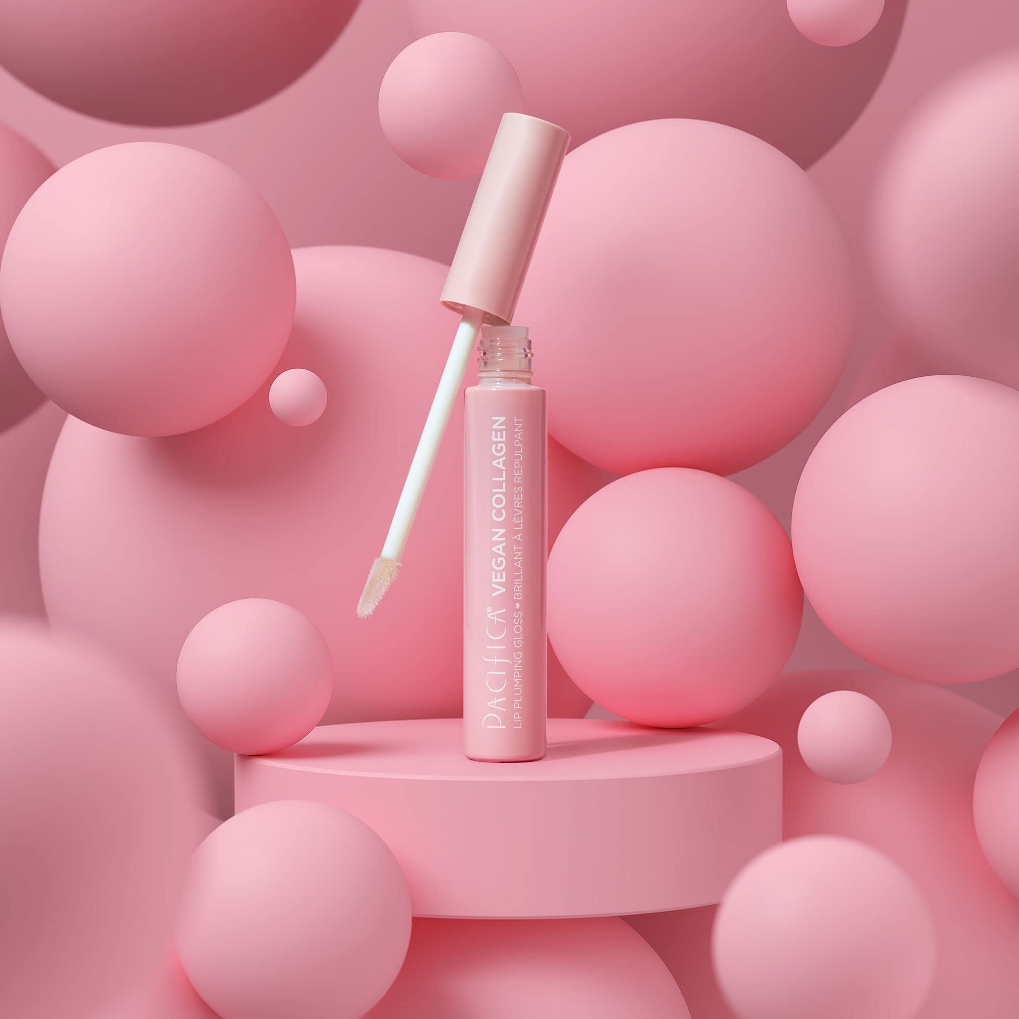 Pacifica model wearing gloss in lifestyle setting demonstrating radiant, fuller-looking lips