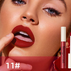 Pakivs swatch strip of red shades on arm to illustrate true color payoff benefit