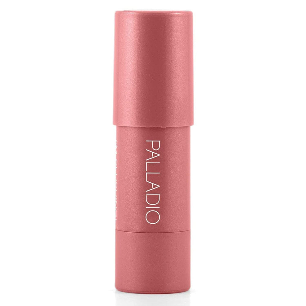 Palladio I'm Blushing next to hand showing travel size and portability benefit