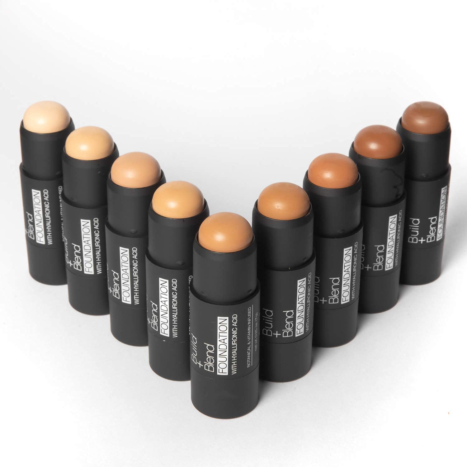 Palladio foundation stick in a travel flatlay showing portability benefit on-the-go touch-ups