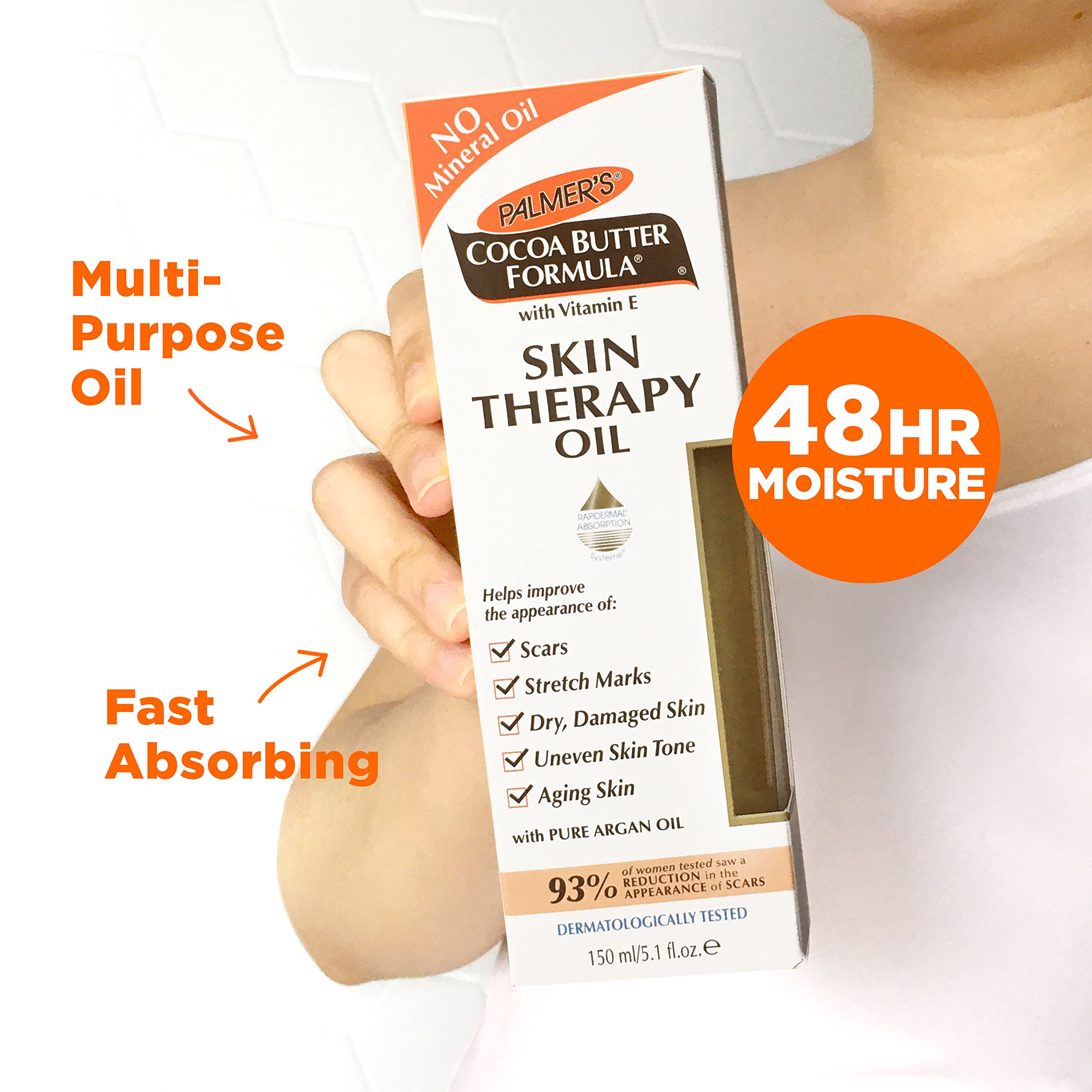 Palmer's oil being smoothed onto arm for softer, smoother skin