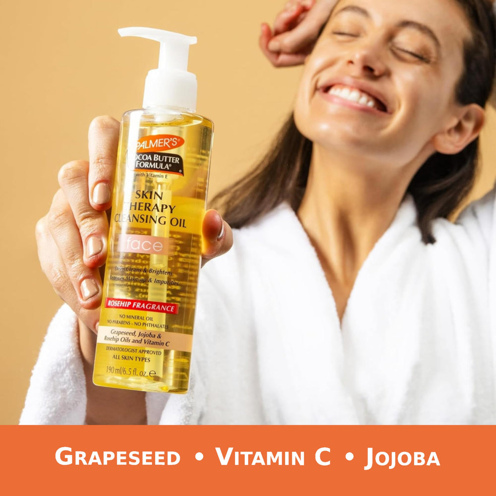 Palmer's pump dispensing cleansing oil into hand, demonstrates easy one-handed use