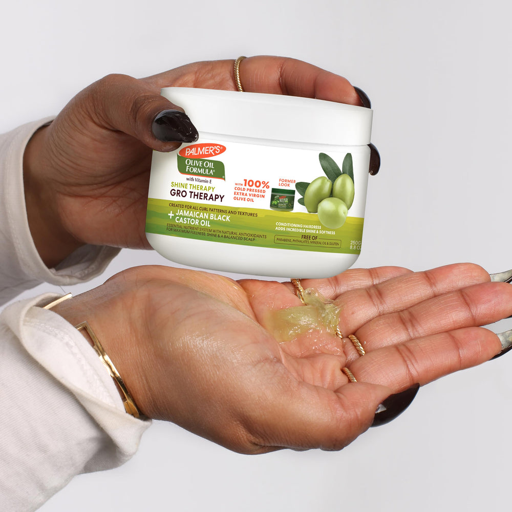 Palmer's with olives and herbs highlighting natural, nourishing ingredients