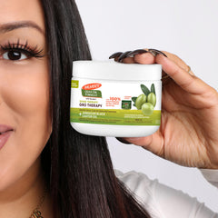 Palmer's being massaged into the scalp to soothe and refresh skin