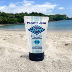 Panama Jack bottle in hand illustrating easy travel‑size portability