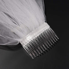 Pangda combs next to ruler showing 7 cm length for scale
