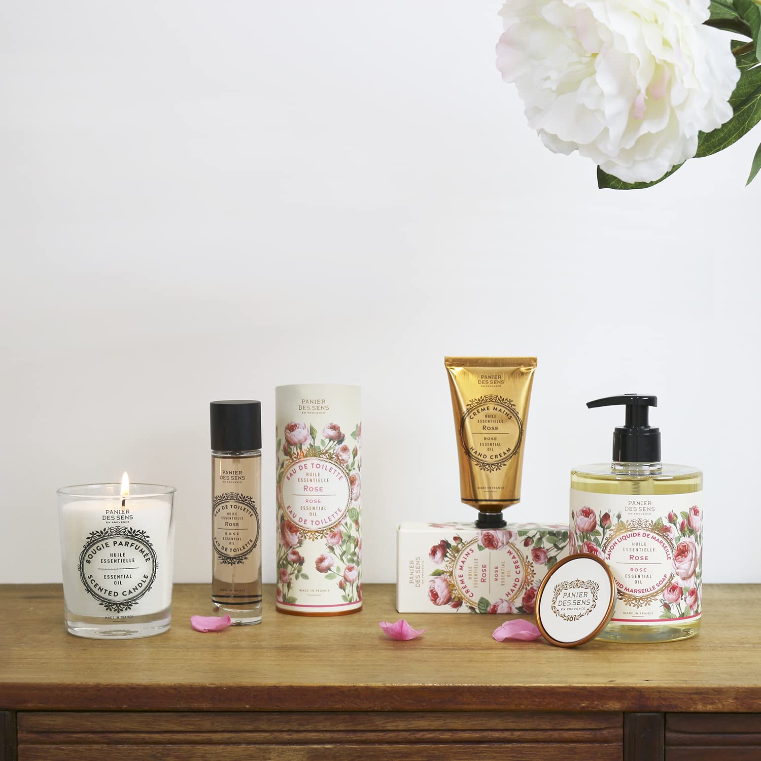 Panier des Sens tube in a handbag lifestyle scene for on-the-go skin care