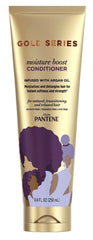 Pantene Gold Series applied to damp hair in bathroom, showing easier detangling