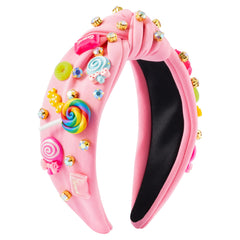 PANTIDE front view showing pink knotted headband and candy charms, adds playful sparkle
