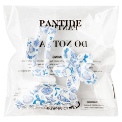 PANTIDE clips on a picnic blanket by the sea, suggests summer-ready accessory look