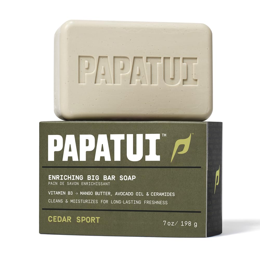 PAPATUI man showering outdoors illustrating invigorating cedar sport scent