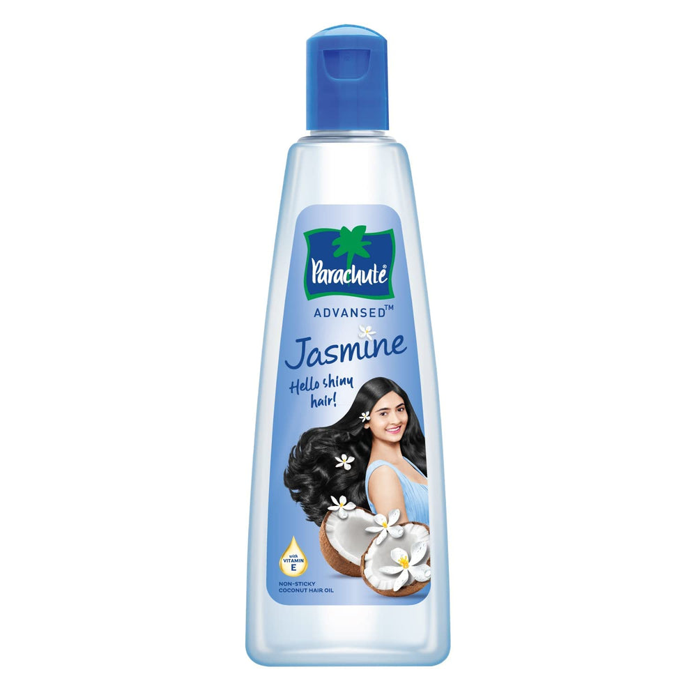 Parachute Advansed pouring oil from bottle demonstrates easy application and nourishment