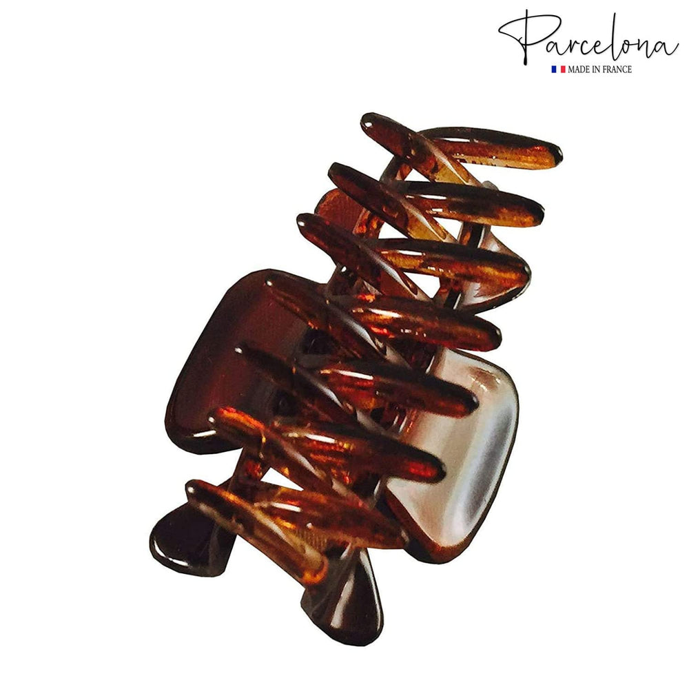 Parcelona securing a mini French twist, tidy small-section styling benefit