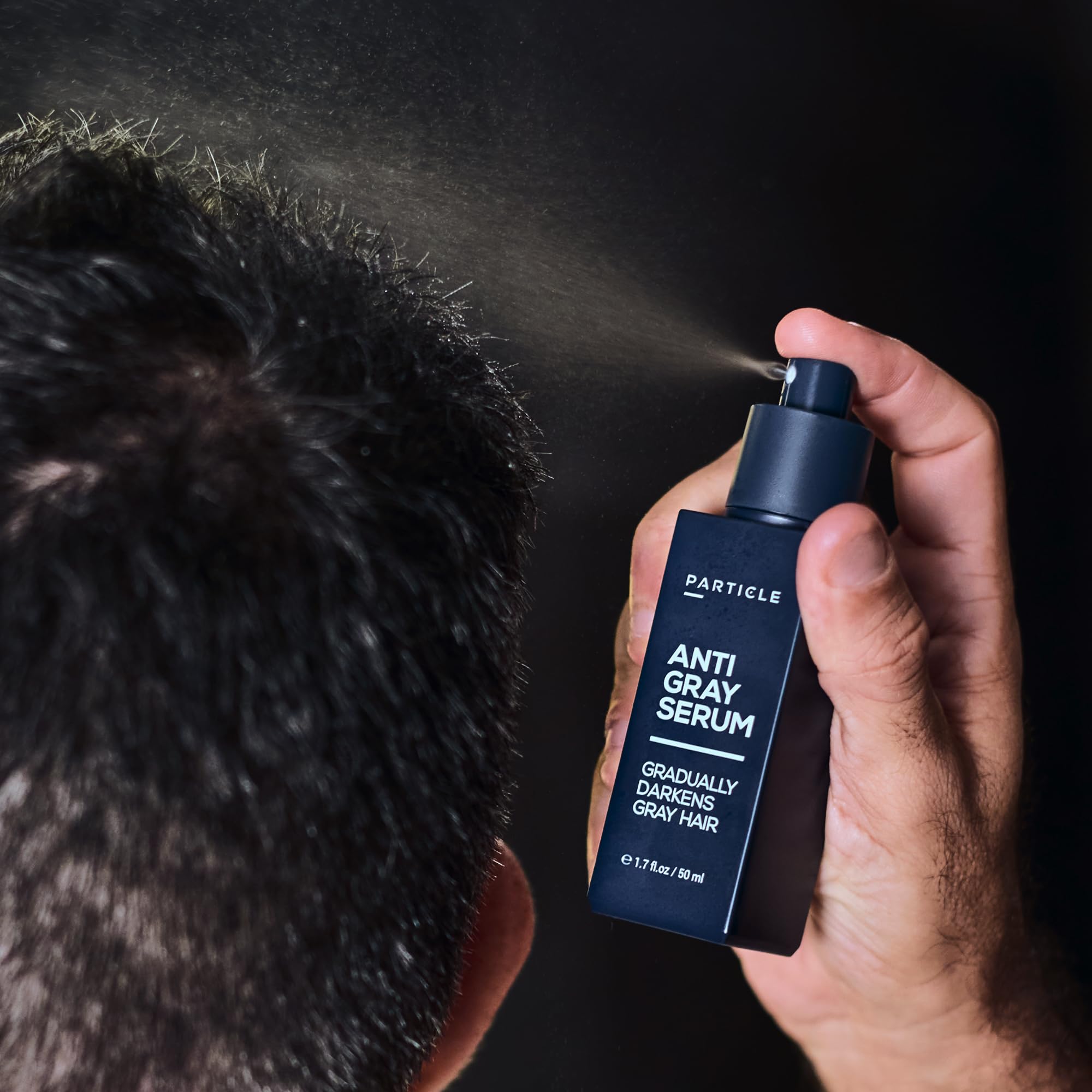 Particle serum next to common toiletry items indicating size and travel-friendly design