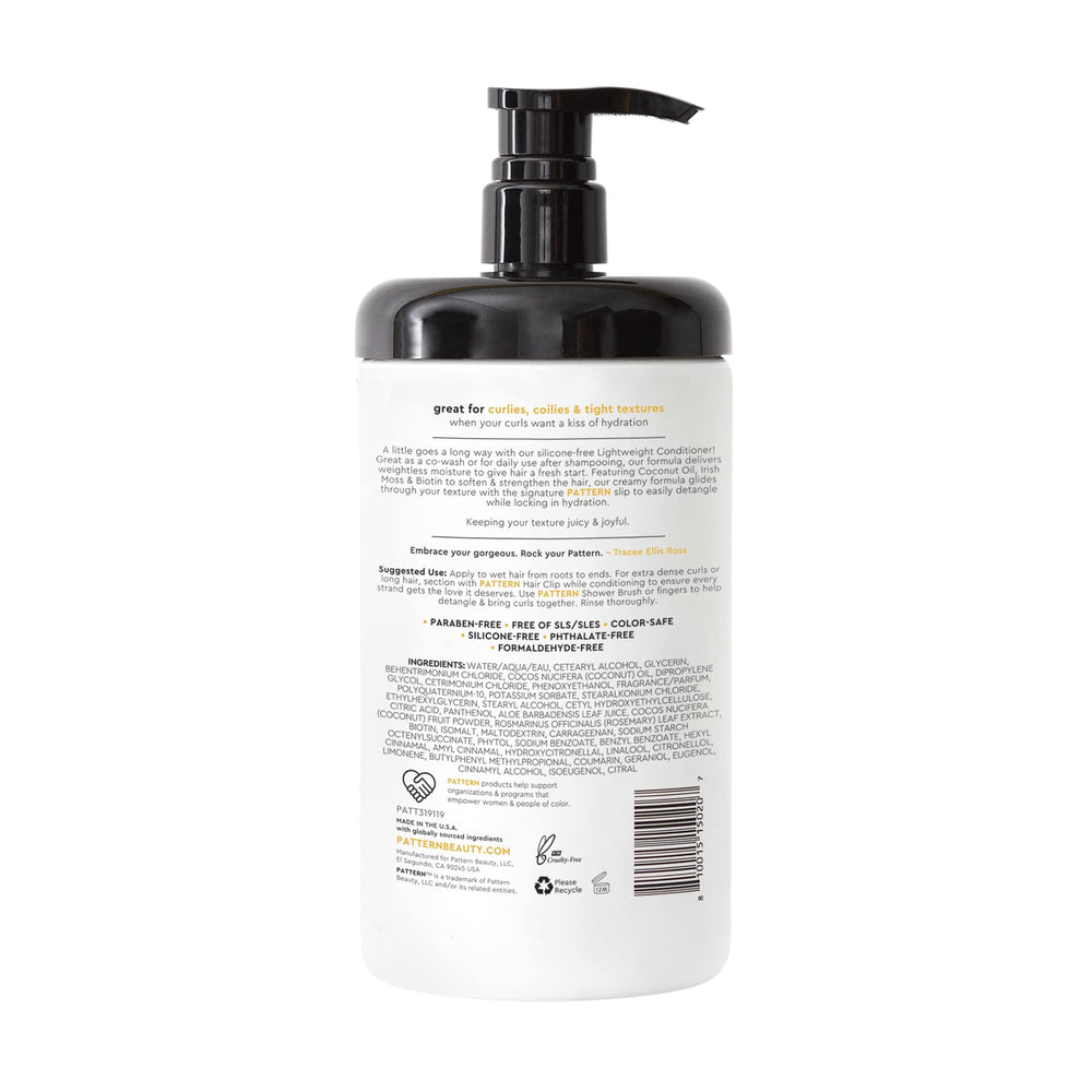 PATTERN conditioner being applied to curly hair for easier detangling