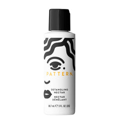 PATTERN detangling nectar bottle front view showing compact travel size and convenience