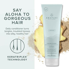 Hand holding Awapuhi Wild Ginger 2.5 fl oz bottle showing travel-friendly size
