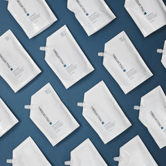 Paul Mitchell pouch on bathroom shelf showing space-saving storage benefit