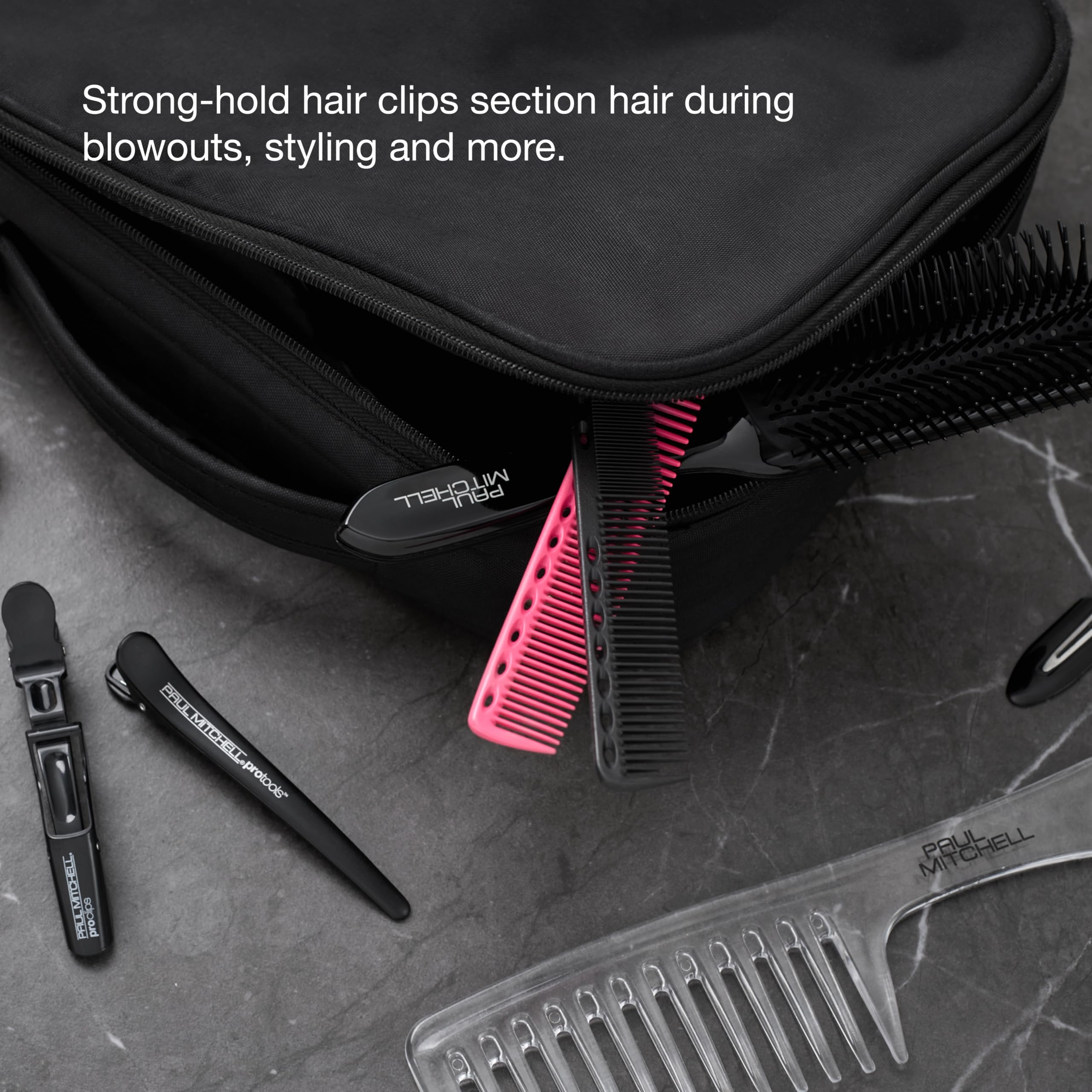 Paul Mitchell clips placed in a stylist kit in a salon setting for professional use