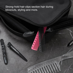 Paul Mitchell clips placed in a stylist kit in a salon setting for professional use