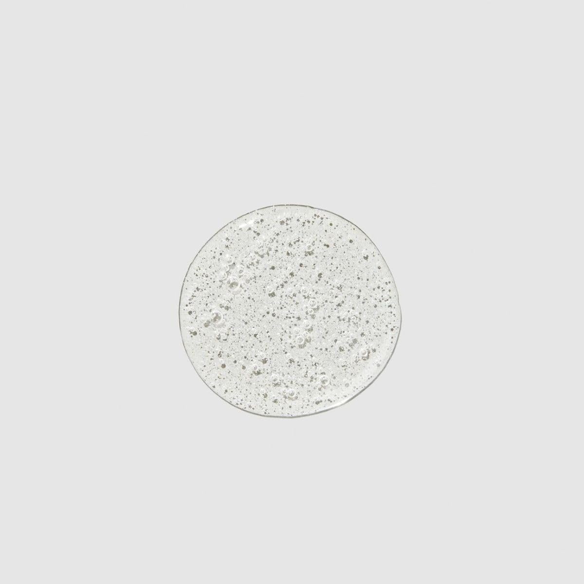Paul Mitchell shampoo texture on hand demonstrating rich, gentle lather