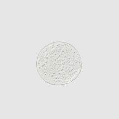 Paul Mitchell shampoo texture on hand demonstrating rich, gentle lather