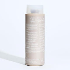 Paul Mitchell recycled packaging detail emphasizing reduced environmental impact