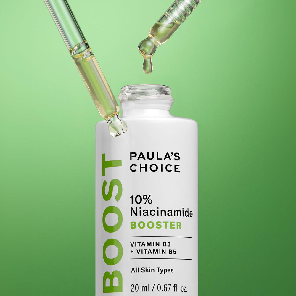 Paula's Choice booster applied during skincare routine illustrating layering with moisturizer