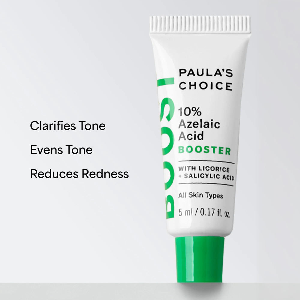 Paula's Choice bottle next to a ruler showing the compact travel size