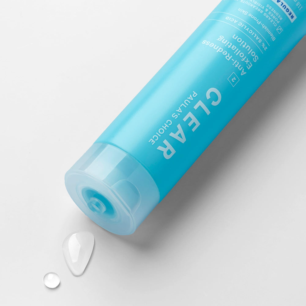 Paula's Choice close-up of label highlighting 2% salicylic acid and fragrance-free benefit