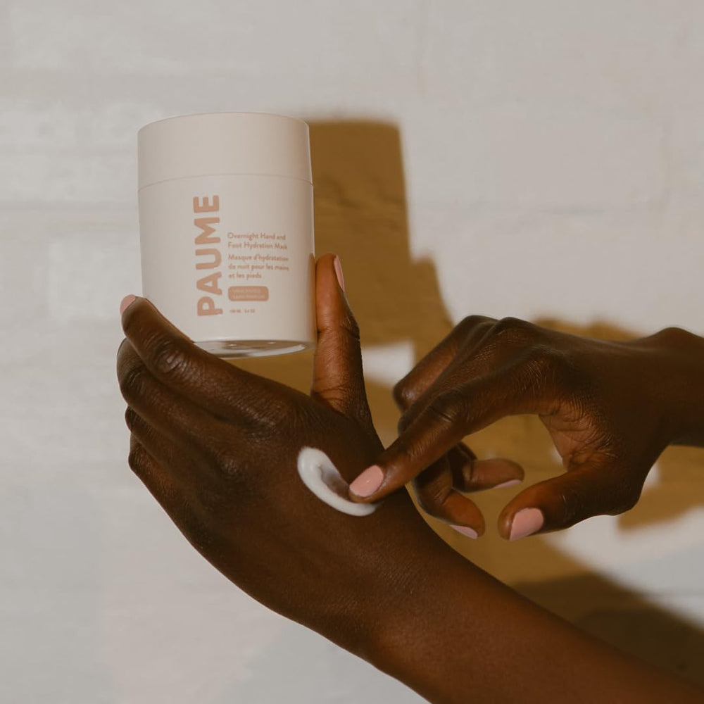PAUME next to everyday items showing 3.4 oz size and portability