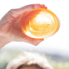 Label and ingredient list on Pears amber bar emphasizing natural oils and glycerin benefits