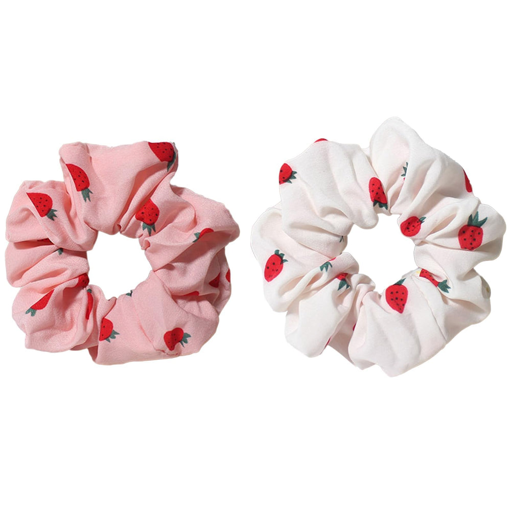 Pejlnd front view of strawberry print scrunchies showing colorful design and easy styling benefit