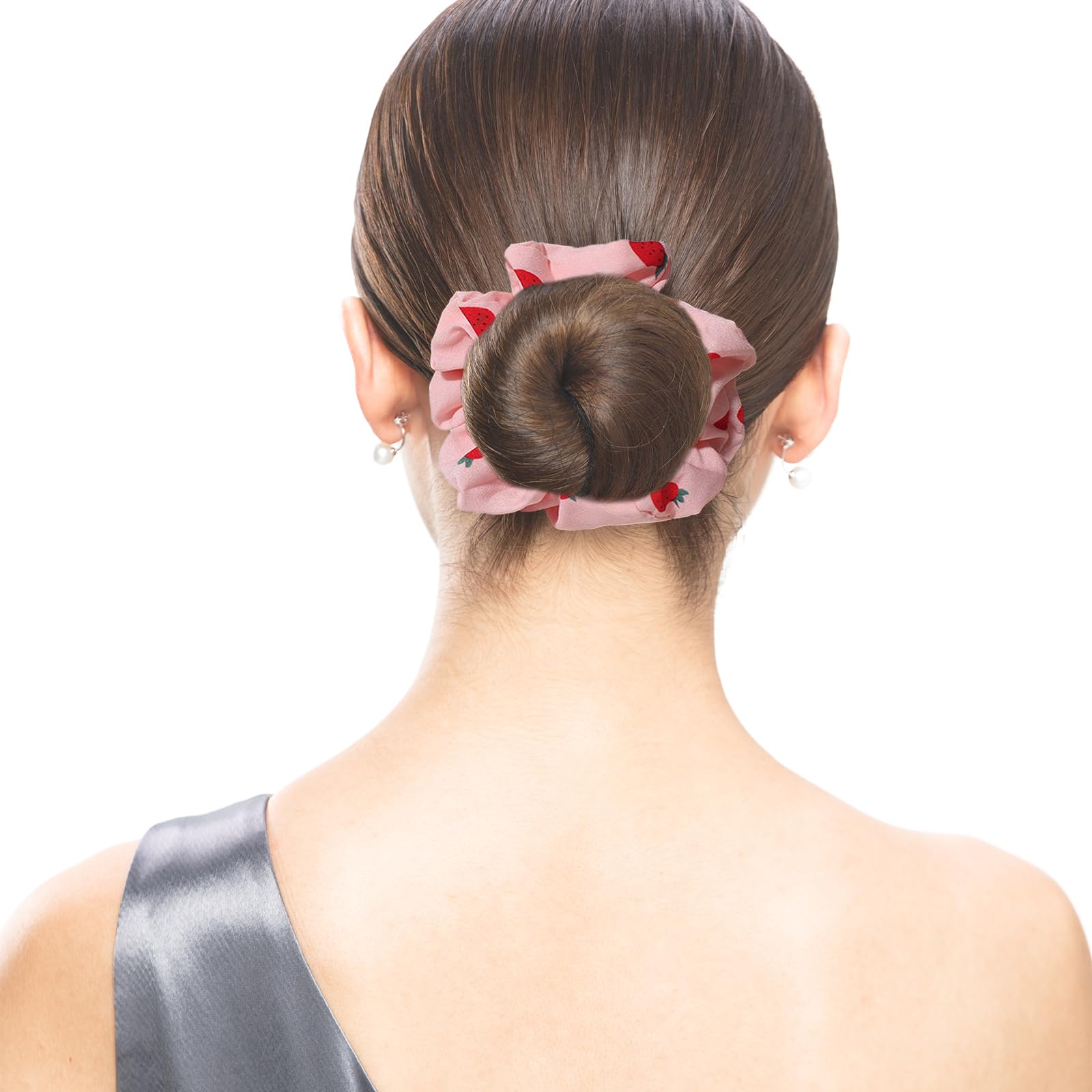 Pejlnd scrunchies held in hand showing large size for secure hold on thick hair