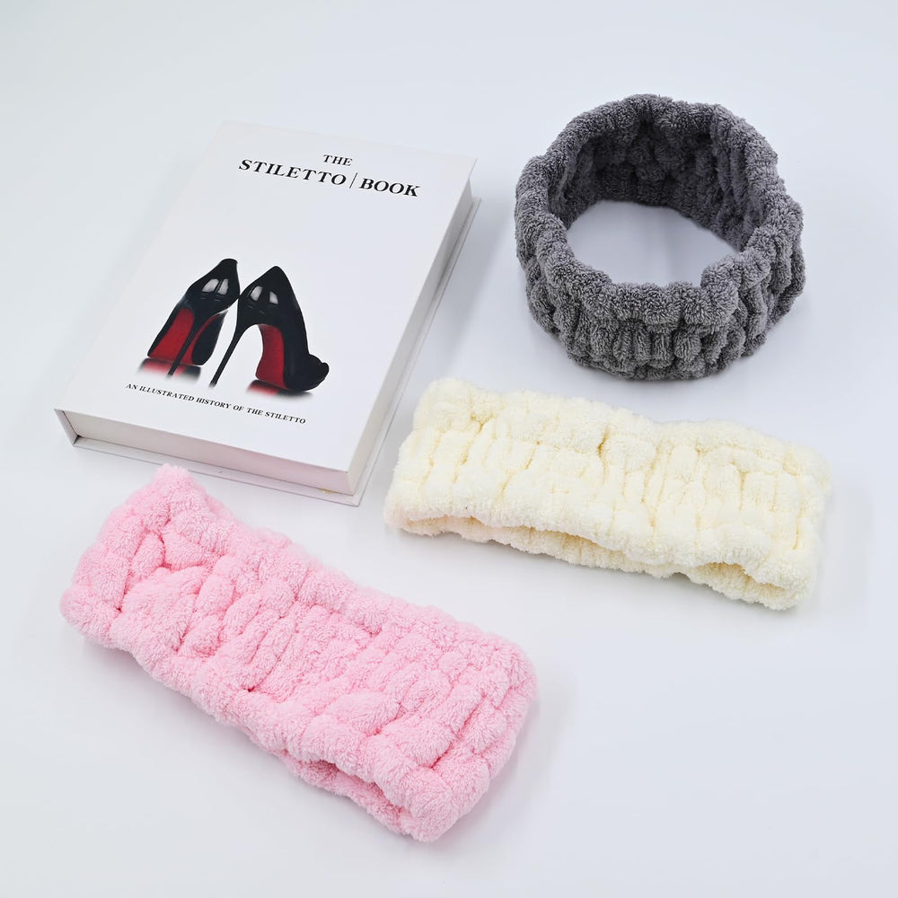 Pejnl flat lay of gray milk white and pink headbands, easy color options