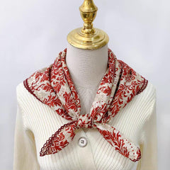 Pemilosci bandana looped on handbag for color pop and decorative practicality