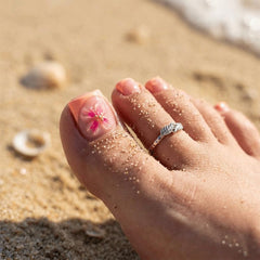 PEPFTG close-up floral detail showing precise design and glossy finish benefit