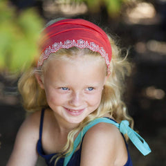 Peppercorn Kids elastic back stretch demonstrating adjustable non-slip comfort