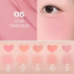 Peripera on model cheeks illustrating natural blurred finish benefit