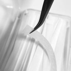 PERMANIA storage box open with strips visible for quick salon access