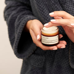 Perricone MD on a nighttime bathroom shelf suggesting bedtime skincare ritual benefit