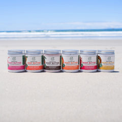 Petal Fresh jar held in hand showing 8 oz scale and travel-friendly benefit
