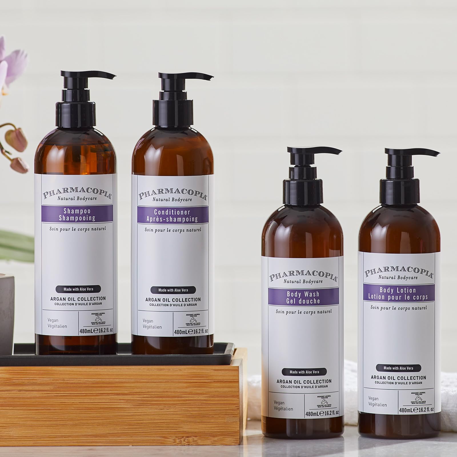 Pharmacopia staged on shower shelf in bathroom for lifestyle appeal and display benefit