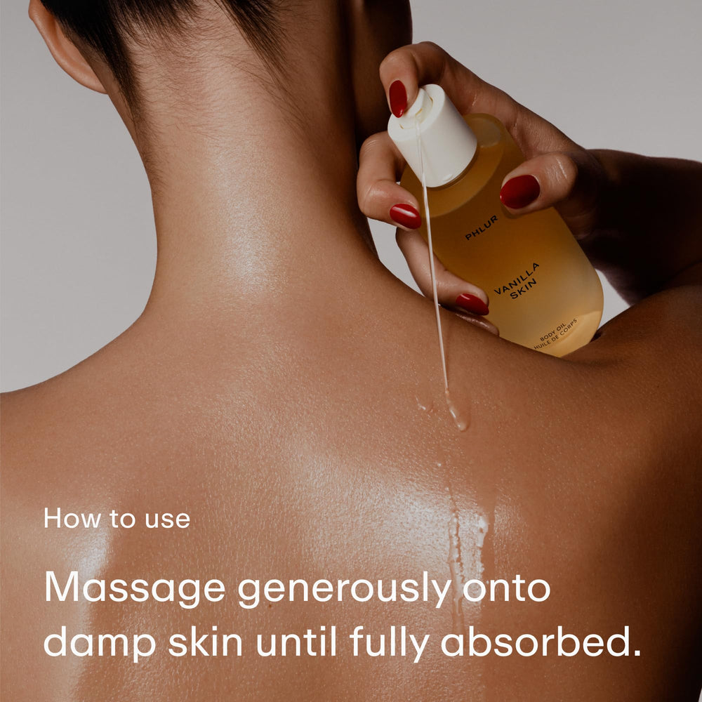 PHLUR applying oil to forearm for visible hydration and radiant finish