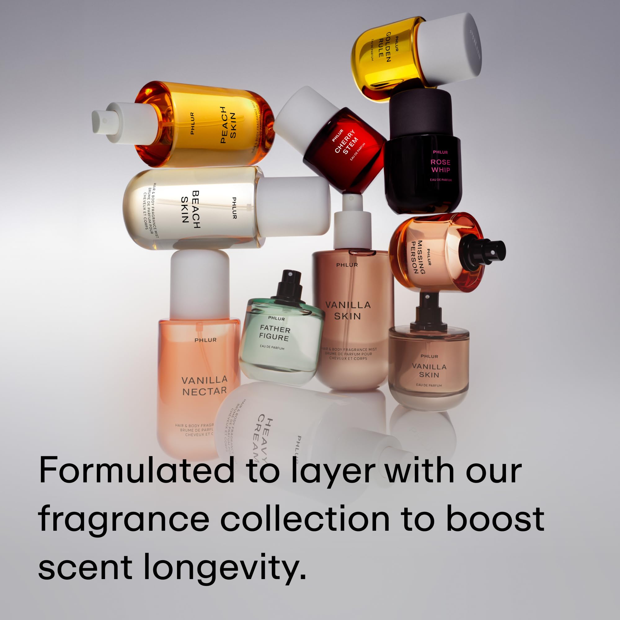 PHLUR ingredient display with florals and wood chips showing natural scent composition benefit